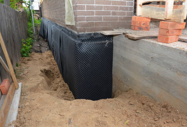 Happy homeowners after waterproofing job in Waldorf